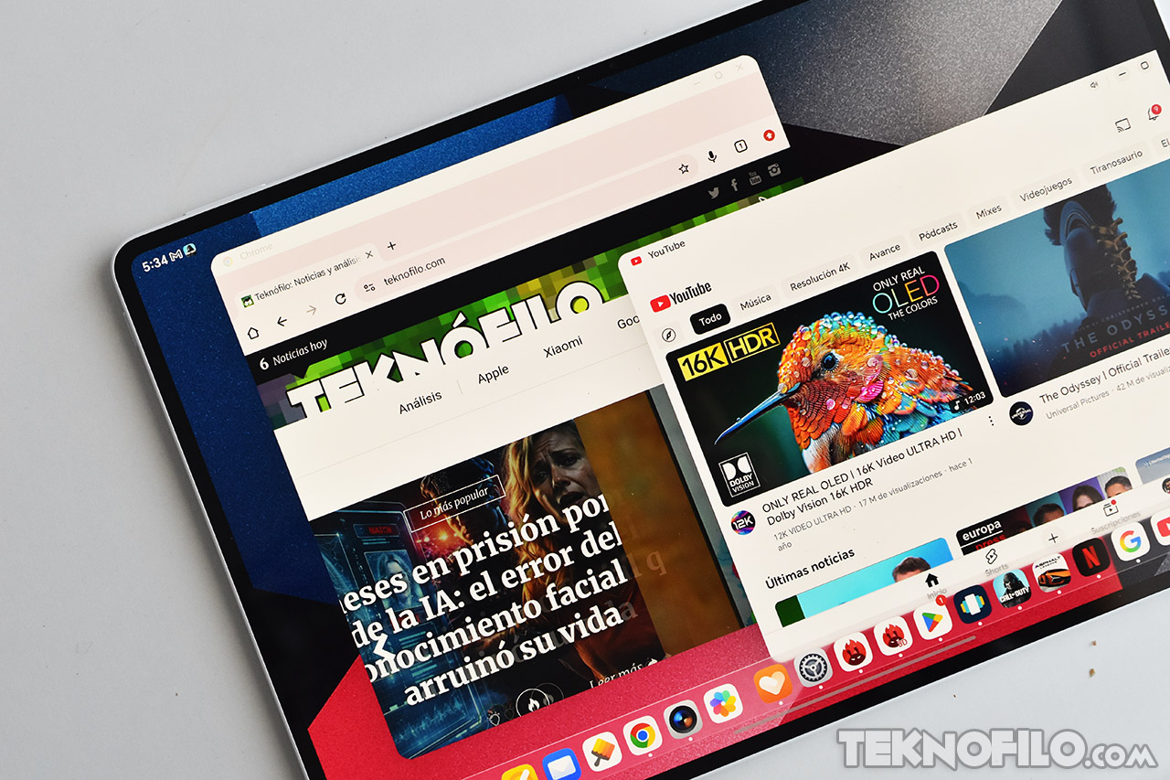 Pantalla de tablet con navegadores abiertos: sitio web de tecnología y YouTube, mostrando contenido de 16K HDR.