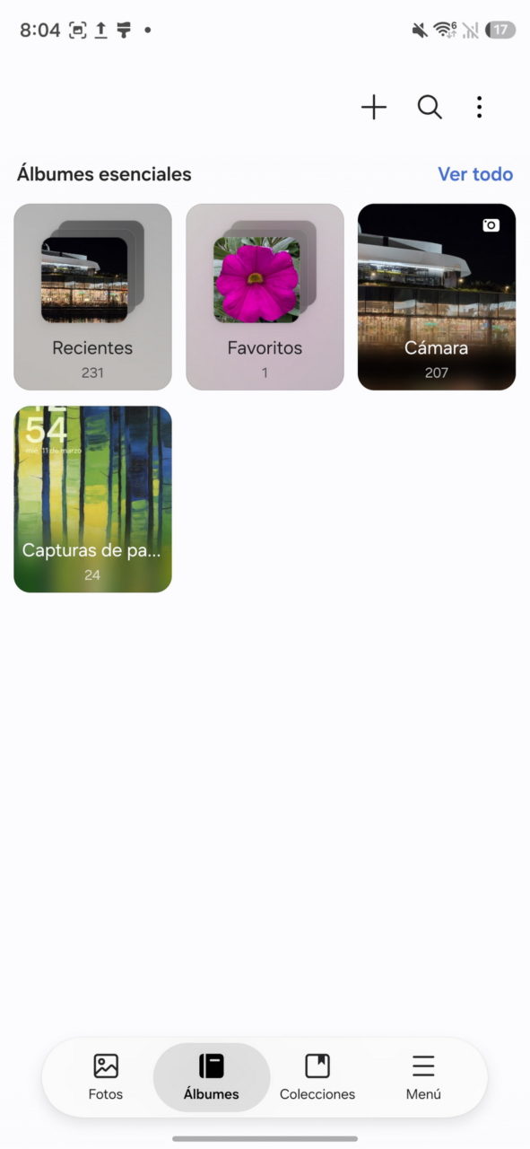 Pantalla de aplicación de fotos con álbumes: recientes, favoritos, cámara y capturas de pantalla.