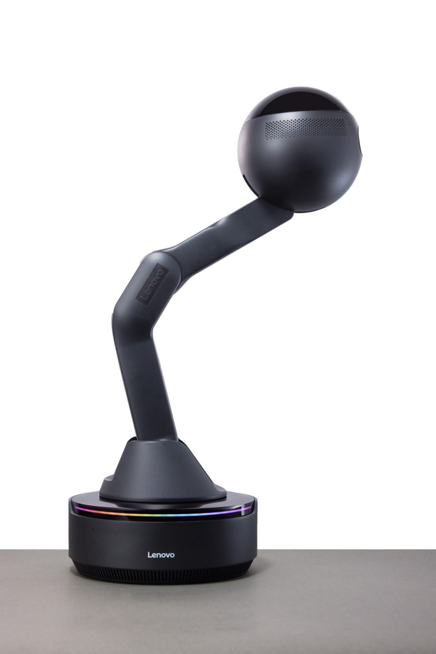 Proyector Lenovo moderno con diseño innovador en fondo blanco. Tecnología avanzada para presentaciones.