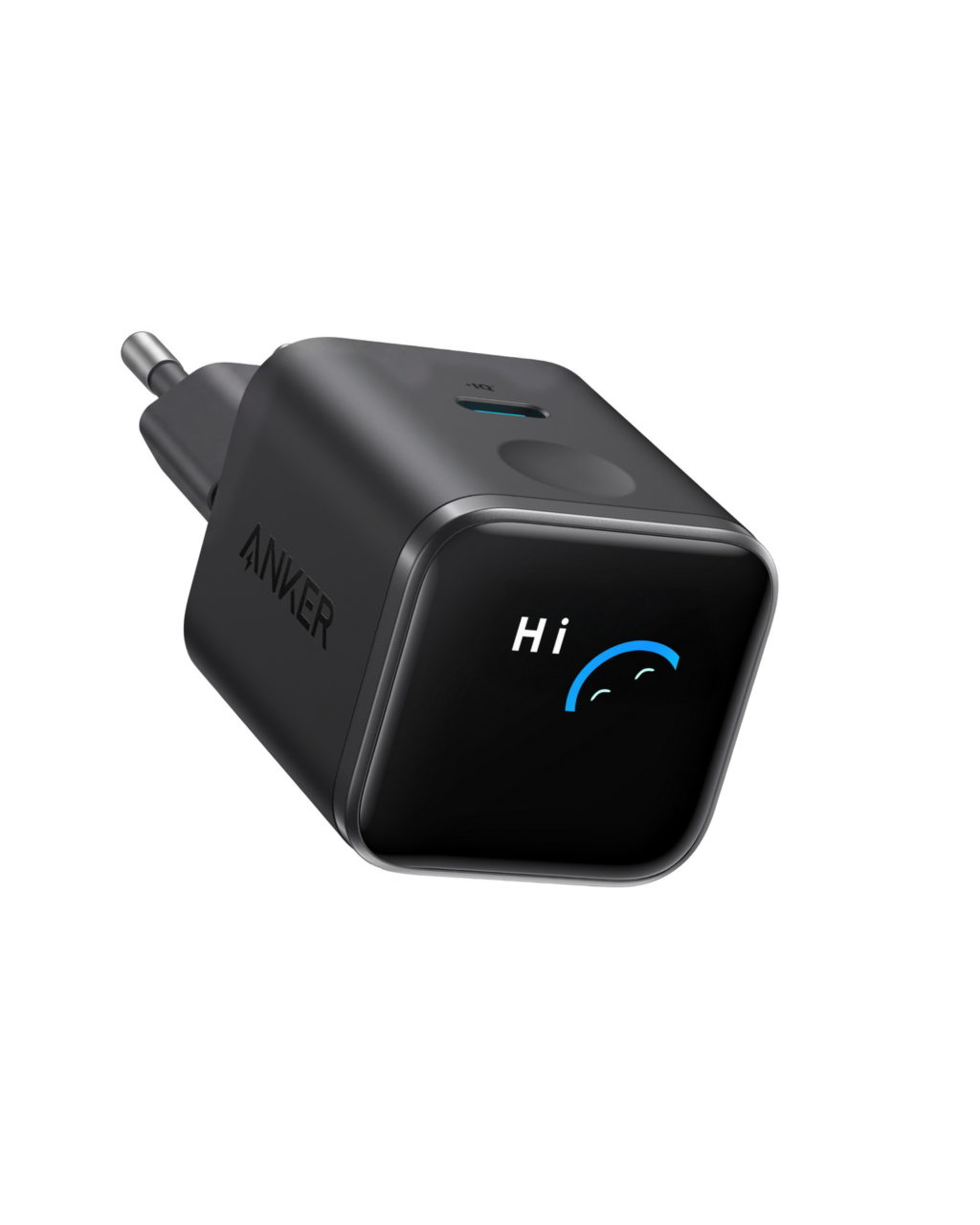 Cargador USB-C negro Anker con pantalla luminosa que muestra un mensaje de saludo. Ideal para carga rápida de dispositivos.