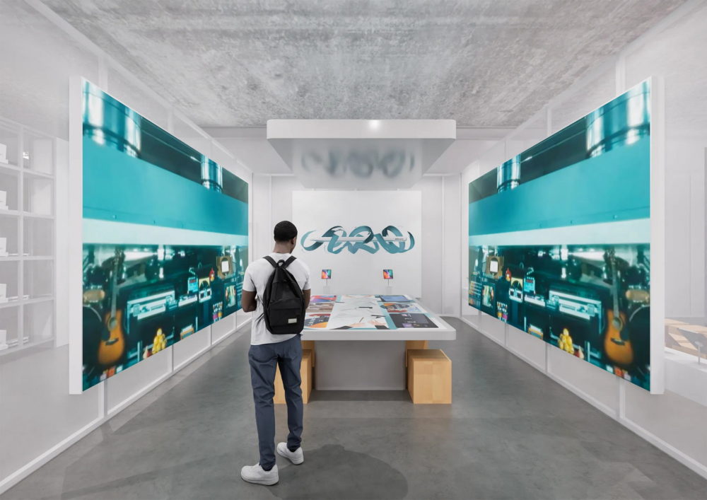 Así es el nuevo Apple Museum de 2.000 metros cuadrados que acaba de abrir en Europa Usuario explorando exposición de arte moderno en galería, con pantallas interactivas de fondo.