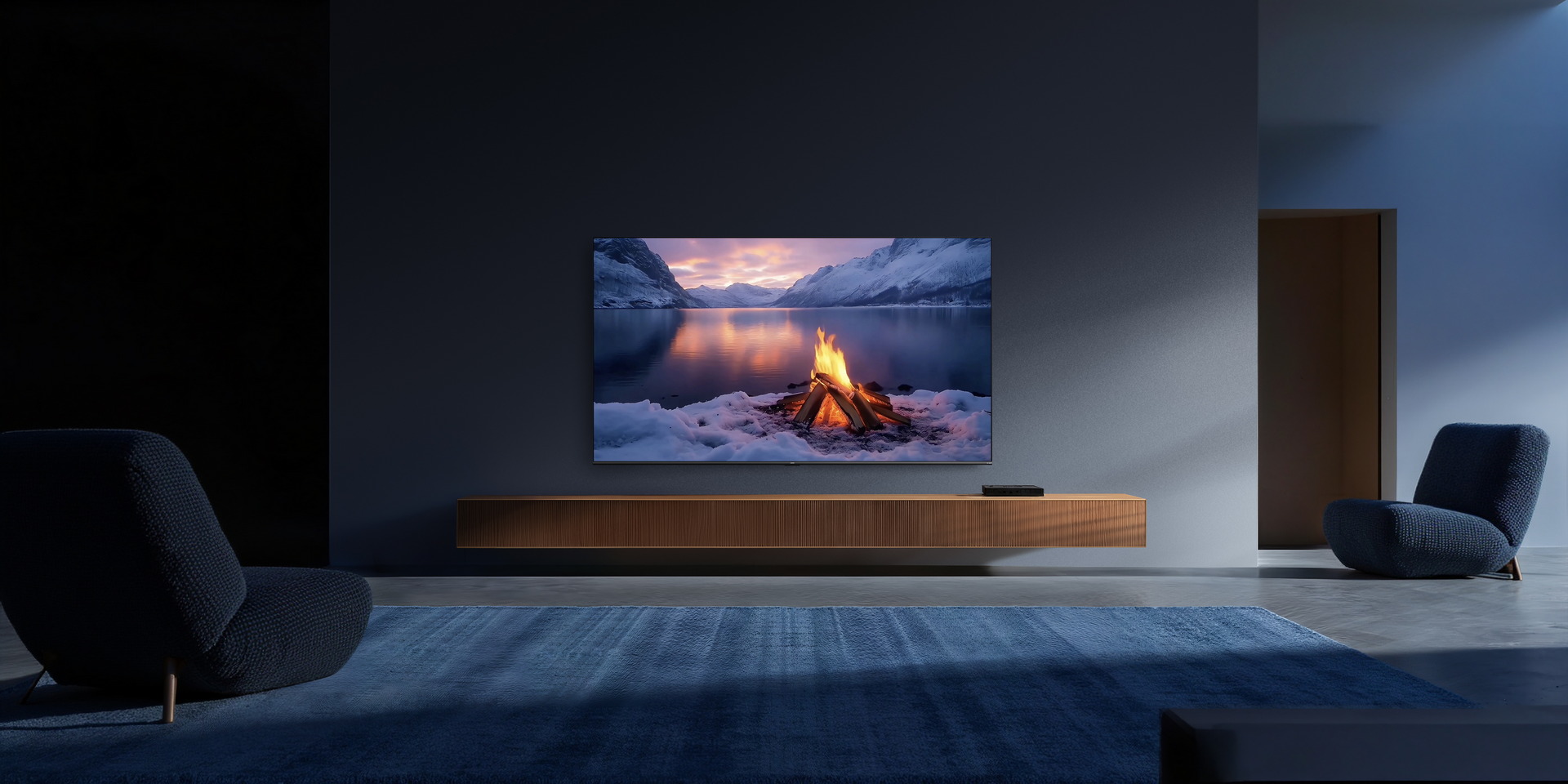 Televisor en sala moderna con paisaje invernal y fogata en pantalla. Estilo minimalista y elegante.