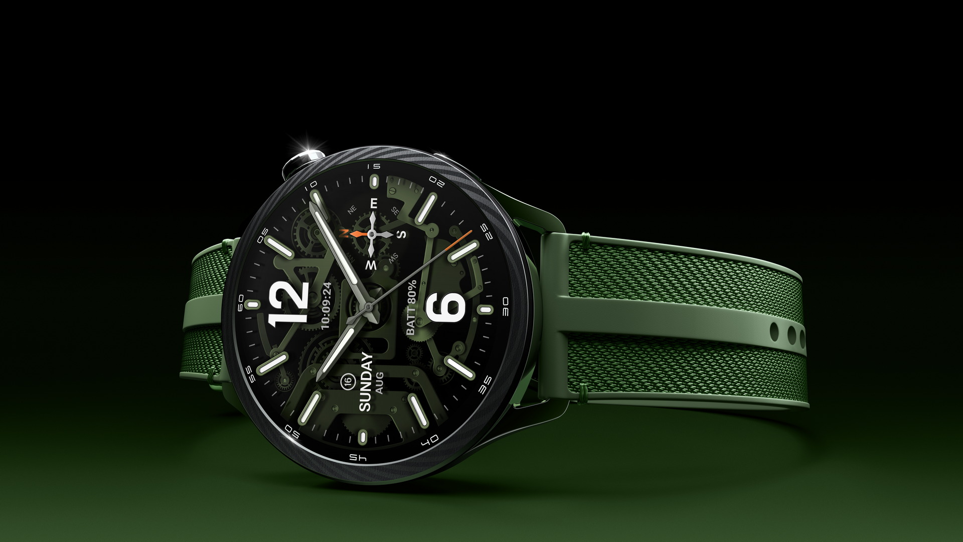 Reloj inteligente verde con pantalla analógica digital, correa tejida y luces brillantes en fondo oscuro.