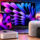 Dispositivos Apple sobre una mesa: laptop, tablet, altavoz y control, con gráficos de tecnología en el fondo.