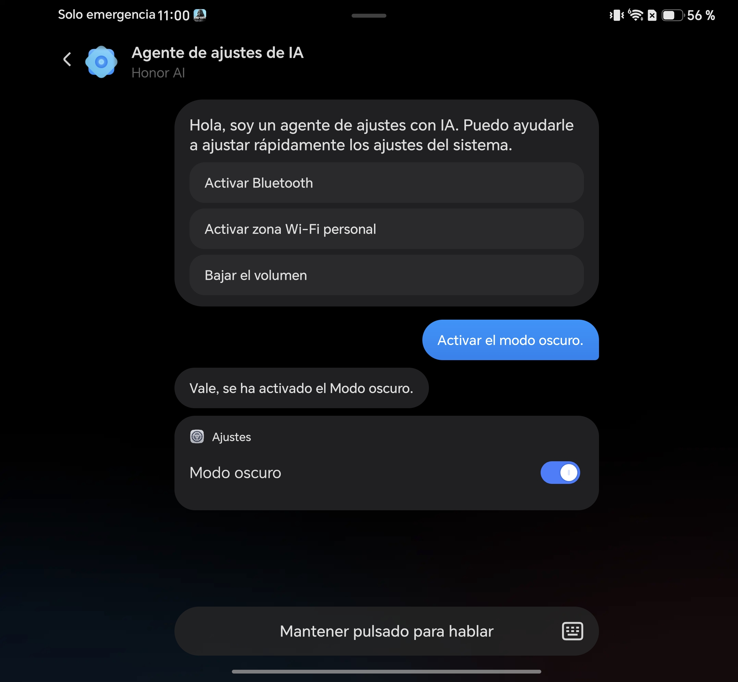 Agente de ajustes de IA en pantalla de móvil, opción de activar modo oscuro visible.