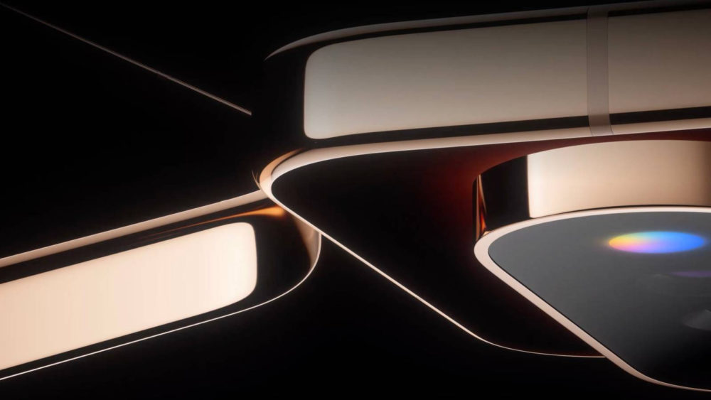 Diseño futurista de dispositivo tecnológico con detalles metálicos y juego de luces en pantalla.