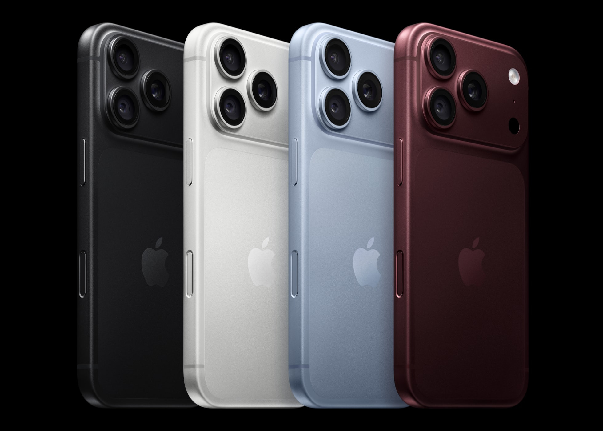 Cuatro modelos de smartphone en diversos colores: negro, blanco, azul y rojo, con cámaras triples.